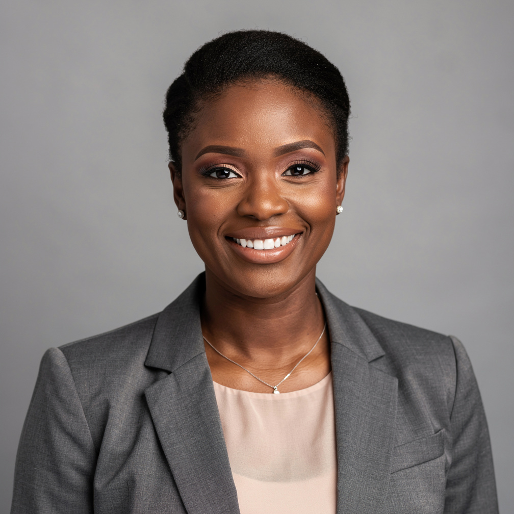 Studio portrait of a woman managing editor smiling at the camera